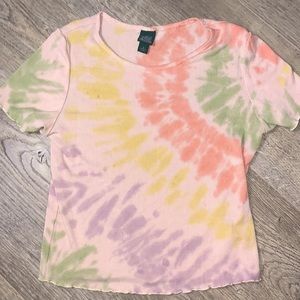 The top is multi colored. It is from wild fable. It is also very soft.